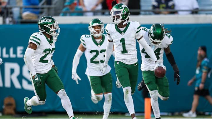 Dec 15, 2024; Jacksonville, Florida, USA; New York Jets cornerback Sauce Gardner (1) celebrates after an interception against the Jacksonville Jaguars in the fourth quarter at EverBank Stadium. Mandatory Credit: Nathan Ray Seebeck-Imagn Images