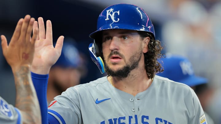 Jul 20, 2025; Miami, Florida, USA; Kansas City Royals designated hitter Vinnie Pasquantino (9) celebrates after scoring against the Miami Marlins during the fourth inning at loanDepot Park. Mandatory Credit: Sam Navarro-Imagn Images