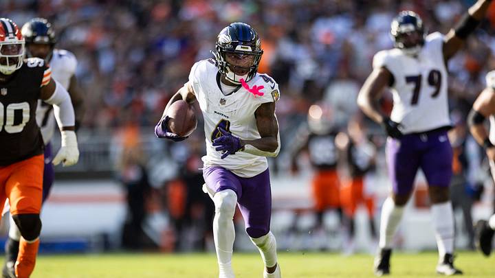 Oct 27, 2024; Cleveland, Ohio, USA; Baltimore Ravens wide receiver Zay Flowers (4) runs the ball against the Cleveland Browns during the fourth quarter at Huntington Bank Field. Mandatory Credit: Scott Galvin-Imagn Images Oct 27, 2024; Cleveland, Ohio, USA; Baltimore Ravens wide receiver Zay Flowers (4) runs the ball against the Cleveland Browns during the fourth quarter at Huntington Bank Field. Mandatory Credit: Scott Galvin-Imagn Images