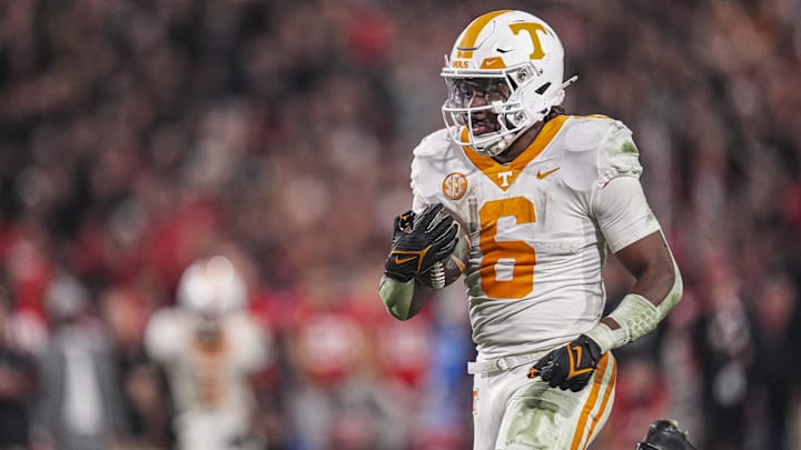 Nov 16, 2024; Athens, Georgia, USA; Tennessee Volunteers running back Dylan Sampson (6) runs for a touchdown against the Georgia Bulldogs during the first half at Sanford Stadium. 