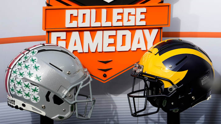 Nov. 25, 2023; Ann Arbor, Mi., USA;
Helmets for the Ohio State Buckeyes and the Michigan Wolverines decorate the on-field set for ESPN  s College GameDay before Saturday  s NCAA Division I football game at Michigan Stadium.