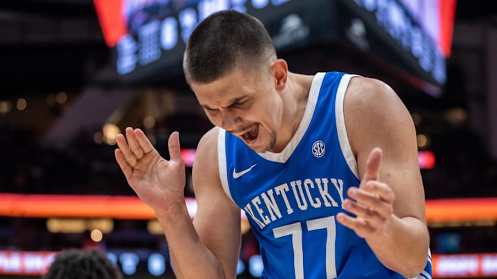Dec 7, 2024; Seattle, Washington, USA;  Kentucky Wildcats guard Kerr Kriisa (77) reacts during the first half against the Gonzaga Bulldogs at Climate Pledge Arena. Mandatory Credit: Stephen Brashear-Imagn Images