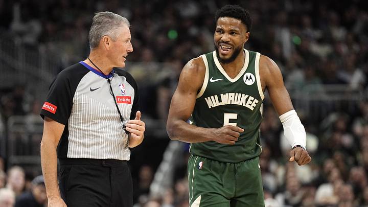 Apr 30, 2024; Milwaukee, Wisconsin, USA;  Milwaukee Bucks guard Malik Beasley (5) talks with referee Scott Foster (48) during the third quarter against the Indiana Pacers during game five of the first round for the 2024 NBA playoffs at Fiserv Forum. Mandatory Credit: Jeff Hanisch-Imagn Images