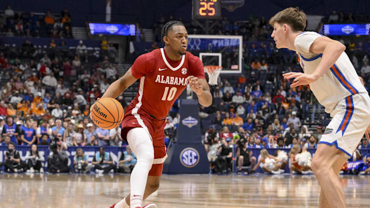 Mar 15, 2025; Nashville, TN, USA; Alabama Crimson Tide forward Mouhamed Dioubate (10) dribbles the ball against the Florida Gators during the second half at Bridgestone Arena. Mandatory Credit: Steve Roberts-Imagn Images Mar 15, 2025; Nashville, TN, USA; Alabama Crimson Tide forward Mouhamed Dioubate (10) dribbles the ball against the Florida Gators during the second half at Bridgestone Arena. Mandatory Credit: Steve Roberts-Imagn Images