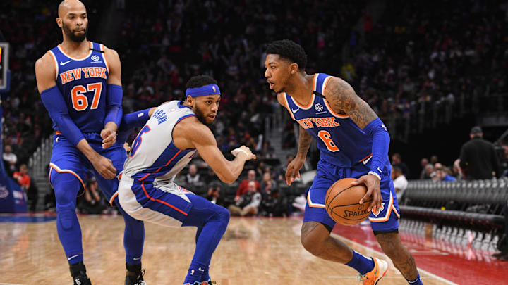 Feb 8, 2020; Detroit, Michigan, USA; New York Knicks guard Elfrid Payton (6) drives to the basket as center Taj Gibson (67) sets a pick on Detroit Pistons guard Bruce Brown (6) during the third quarter at Little Caesars Arena. Mandatory Credit: Tim Fuller-Imagn Images