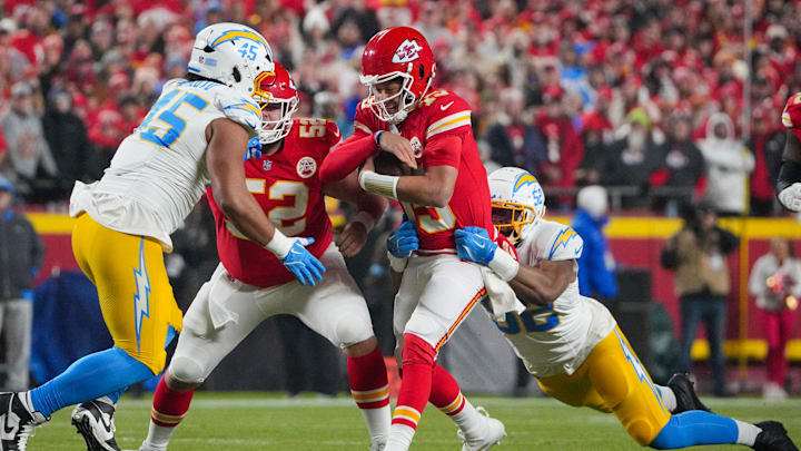 Dec 8, 2024; Kansas City, Missouri, USA; Kansas City Chiefs quarterback Patrick Mahomes (15) is sacked by Los Angeles Chargers linebacker Khalil Mack (52) during the first half at GEHA Field at Arrowhead Stadium. Mandatory Credit: Denny Medley-Imagn Images Dec 8, 2024; Kansas City, Missouri, USA; Kansas City Chiefs quarterback Patrick Mahomes (15) is sacked by Los Angeles Chargers linebacker Khalil Mack (52) during the first half at GEHA Field at Arrowhead Stadium. Mandatory Credit: Denny Medley-Imagn Images