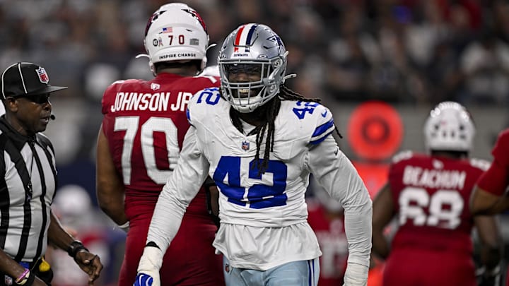 Nov 3, 2025; Arlington, Texas, USA; Dallas Cowboys defensive end Jadeveon Clowney (42) celebrates after he sacks Arizona Cardinals quarterback Jacoby Brissett (7) during the game between the Dallas Cowboys and the Arizona Cardinals at AT&T Stadium. Mandatory Credit: Jerome Miron-Imagn Images