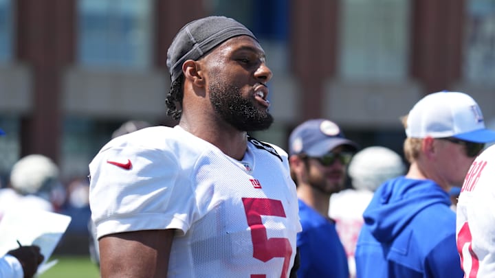 Jul 26, 2024; East Rutherford, NJ, USA; New York Giants linebacker Kayvon Thibodeaux (5) speaks on the sideline during training camp at Quest Diagnostics Training Center.  