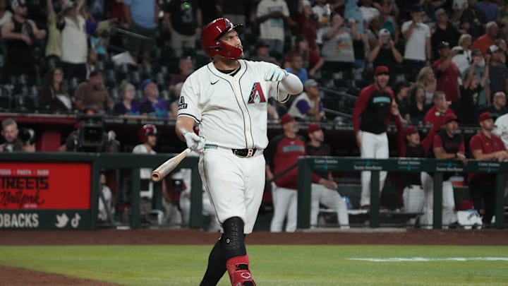 Jun 9, 2025; Phoenix, Arizona, USA; Arizona Diamondbacks first base Josh Naylor (22) hits a walk off grand slam home run against the Seattle Mariners in the eleventh inning at Chase Field. Mandatory Credit: Rick Scuteri-Imagn Images