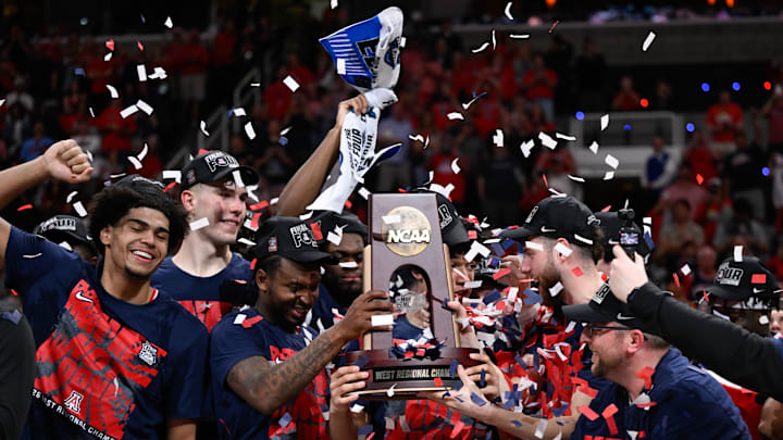 The Arizona Wildcats celebrate after winning the the West Regional final over Purdue to advance to the Final Four. The Arizona Wildcats celebrate after winning the the West Regional final over Purdue to advance to the Final Four.