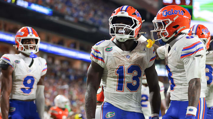 Florida Gators running back Jadan Baugh celebrates after scoring a touchdown against the Miami Hurricanes during the third quarter at Hard Rock Stadium. Florida Gators running back Jadan Baugh celebrates after scoring a touchdown against the Miami Hurricanes during the third quarter at Hard Rock Stadium.