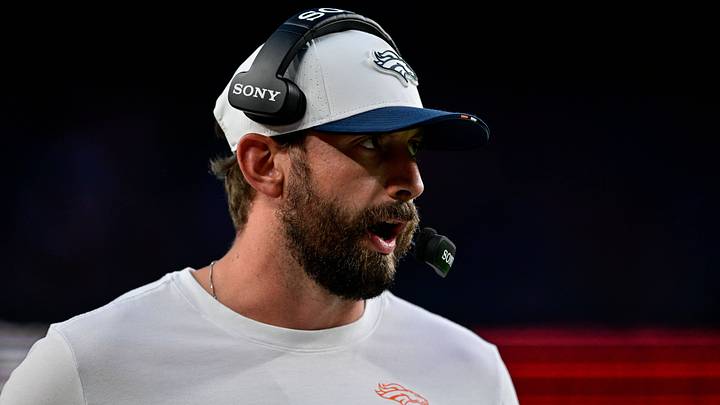 DENVER, CO - AUGUST 16: Denver Broncos quarterbacks coach Davis Webb calls plays vs. the Arizona Cardinals in preseason action. DENVER, CO - AUGUST 16: Denver Broncos quarterbacks coach Davis Webb calls plays vs. the Arizona Cardinals in preseason action.