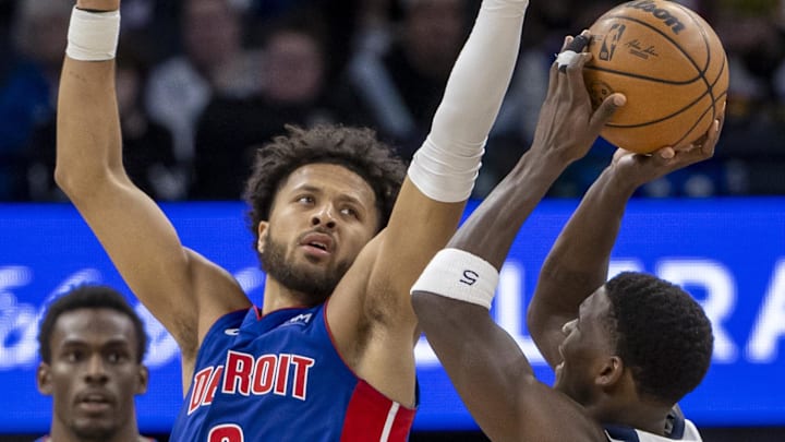Mar 27, 2024; Minneapolis, Minnesota, USA; Detroit Pistons guard Cade Cunningham (2) jumps up and plays defense in front ofMinnesota Timberwolves guard Anthony Edwards (5) in the second half at Target Center. Mandatory Credit: Jesse Johnson-Imagn Images Mar 27, 2024; Minneapolis, Minnesota, USA; Detroit Pistons guard Cade Cunningham (2) jumps up and plays defense in front ofMinnesota Timberwolves guard Anthony Edwards (5) in the second half at Target Center. Mandatory Credit: Jesse Johnson-Imagn Images