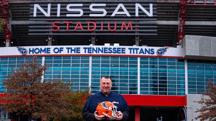 Illinois football coach Bret Bielema poses in front of Nissan Stadium in Nashville, Tennessee, where his Illini will face Tennessee in Tuesday's Music City Bowl. Illinois football coach Bret Bielema poses in front of Nissan Stadium in Nashville, Tennessee, where his Illini will face Tennessee in Tuesday's Music City Bowl.