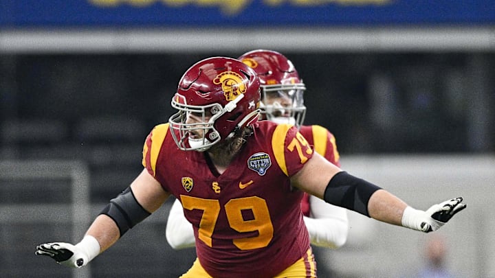 Jan 2, 2023; Arlington, Texas, USA; USC Trojans offensive lineman Jonah Monheim (79) in action during the game between the USC Trojans and the Tulane Green Wave in the 2023 Cotton Bowl at AT&T Stadium. 