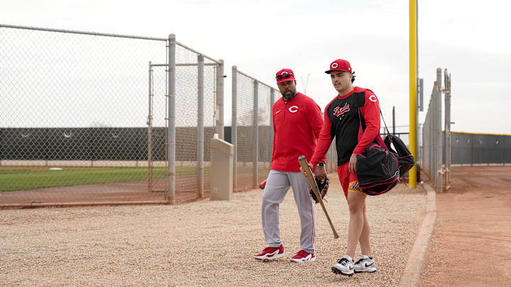 Cincinnati Reds non-roster invitee Sal Stewart walks with Barry Larkin between fields at the Cincinnati Reds Player Development Complex in Goodyear, Ariz., on  Wednesday, Feb. 12, 2025. Mandatory Credit: Sam Greene/USA TODAY NETWORK via Imagn Images