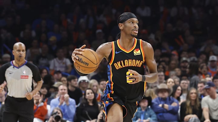 Dec 29, 2024; Oklahoma City, Oklahoma, USA; Oklahoma City Thunder guard Shai Gilgeous-Alexander (2) dribbles the ball down the court against the Memphis Grizzlies during the second quarter at Paycom Center. Mandatory Credit: Alonzo Adams-Imagn Images Dec 29, 2024; Oklahoma City, Oklahoma, USA; Oklahoma City Thunder guard Shai Gilgeous-Alexander (2) dribbles the ball down the court against the Memphis Grizzlies during the second quarter at Paycom Center. Mandatory Credit: Alonzo Adams-Imagn Images