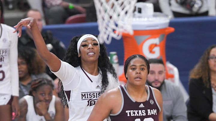 Mississippi State forward Jessika Carter (4) misses a shot near Texas A&M forward Jada Malone