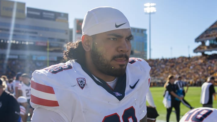 Nov 25, 2023; Tempe, Arizona, USA; Arizona Wildcats defensive lineman Tiaoalii Savea (98) against the Arizona State Sun Devils during the Territorial Cup at Mountain America Stadium. Mandatory Credit: Mark J. Rebilas-USA TODAY Sports Nov 25, 2023; Tempe, Arizona, USA; Arizona Wildcats defensive lineman Tiaoalii Savea (98) against the Arizona State Sun Devils during the Territorial Cup at Mountain America Stadium. Mandatory Credit: Mark J. Rebilas-USA TODAY Sports
