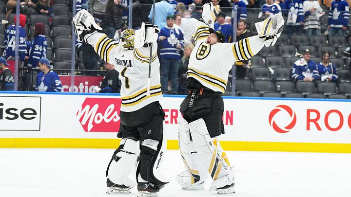 Apr 27, 2024; Toronto, Ontario, CAN; Boston Bruins goaltenders Jeremy Swayman (1) and Linus Ullmark (35) celebrate the win against the Toronto Maple Leafs at the end of the third period in game four of the first round of the 2024 Stanley Cup Playoffs at Scotiabank Arena. Mandatory Credit: Nick Turchiaro-USA TODAY