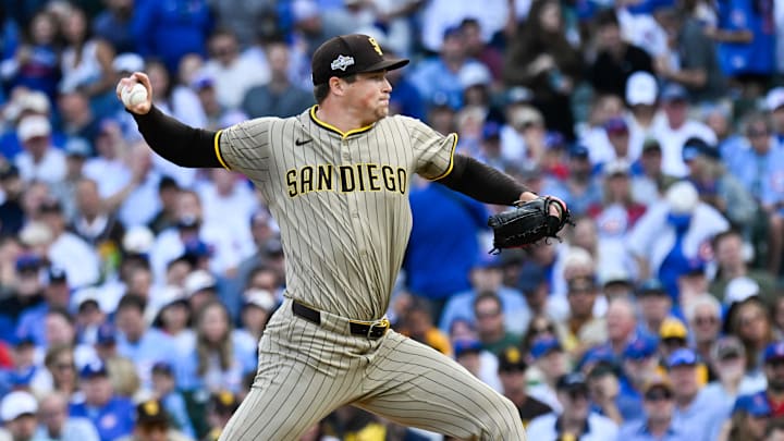 Oct 1, 2025; Chicago, Illinois, USA; San Diego Padres pitcher Mason Miller (22) delivers during the seventh inning against the Chicago Cubs during game two of the Wildcard round for the 2025 MLB playoffs at Wrigley Field. Mandatory Credit: Matt Marton-Imagn Images Oct 1, 2025; Chicago, Illinois, USA; San Diego Padres pitcher Mason Miller (22) delivers during the seventh inning against the Chicago Cubs during game two of the Wildcard round for the 2025 MLB playoffs at Wrigley Field. Mandatory Credit: Matt Marton-Imagn Images