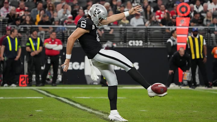 Nov 26, 2023; Paradise, Nevada, USA; Las Vegas Raiders punter AJ Cole (6) punts the ball against the Kansas City Chiefs in the second half at Allegiant Stadium. Mandatory Credit: Kirby Lee-Imagn Images