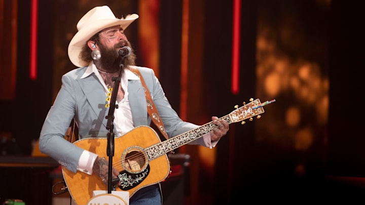 Post Malone performs at Grand Ole Opry in Nashville , Tenn., Wednesday, Aug. 14, 2024.