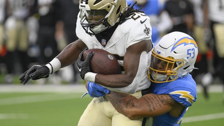 Aug 20, 2023; Inglewood, California, USA; Los Angeles Chargers linebacker Blake Lynch (53) tackles New Orleans Saints running back Kendre Miller (25) after a short pass play in the first quarter at SoFi Stadium. Mandatory Credit: Robert Hanashiro-Imagn Images Aug 20, 2023; Inglewood, California, USA; Los Angeles Chargers linebacker Blake Lynch (53) tackles New Orleans Saints running back Kendre Miller (25) after a short pass play in the first quarter at SoFi Stadium. Mandatory Credit: Robert Hanashiro-Imagn Images