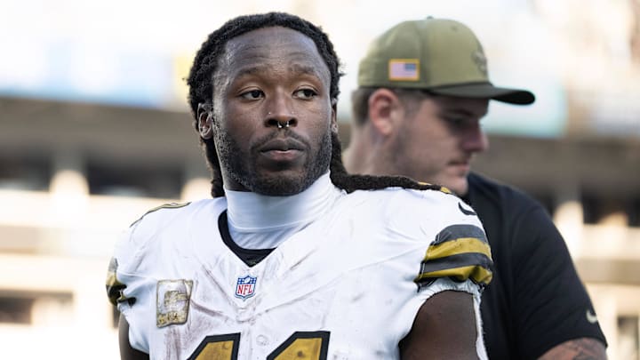 Nov 9, 2025; Charlotte, North Carolina, USA; New Orleans Saints running back Alvin Kamara (41) walks off the field after the game at Bank of America Stadium. Mandatory Credit: Bob Donnan-Imagn Images