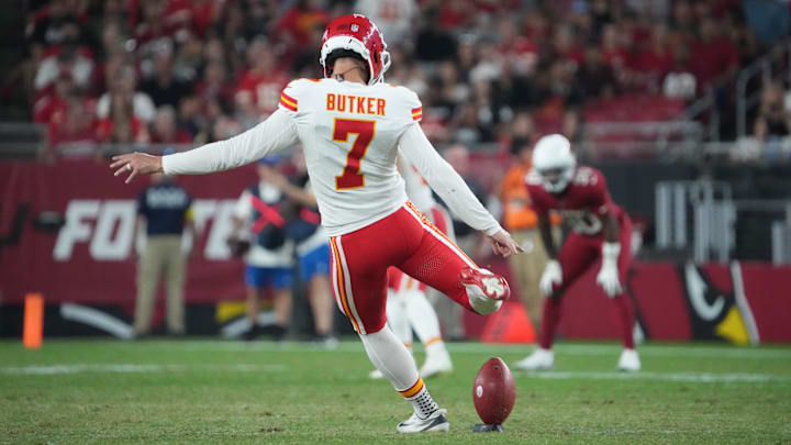 Aug 9, 2025; Glendale, Arizona, USA; Kansas City Chiefs place kicker Harrison Butker (7) kicks off against the Arizona Cardinals during the second half at State Farm Stadium. Mandatory Credit: Joe Camporeale-Imagn Images