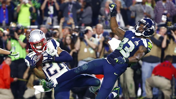 Malcolm Butler (left) made one of the most legendary plays in Super Bowl history the last time the Patriots and Seahawks played. 