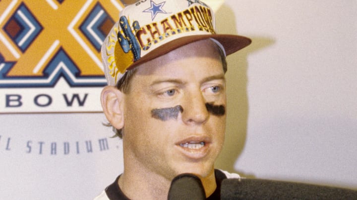 Dallas Cowboys quarterback Troy Aikman talks to the media after defeating the Pittsburgh Steelers 27-17 to win Super Bowl XXX.