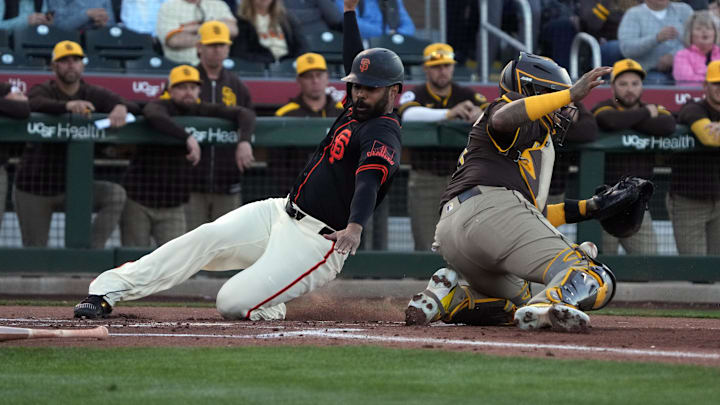 Giants first base LaMonte Wade Jr. (31) scores a run against the San Diego Padres in the first inning at Scottsdale Stadium on March 18. Giants first base LaMonte Wade Jr. (31) scores a run against the San Diego Padres in the first inning at Scottsdale Stadium on March 18.