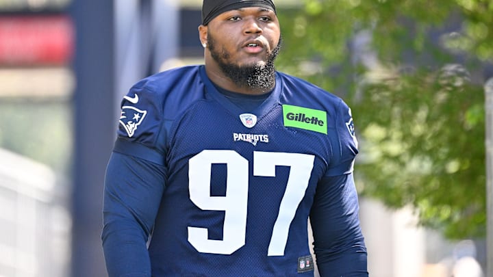 Jul 23, 2025; Foxborough, MA, USA; New England Patriots defensive end Milton Williams (97) walks to the practice field for training camp at Gillette Stadium. Mandatory Credit: Eric Canha-Imagn Images