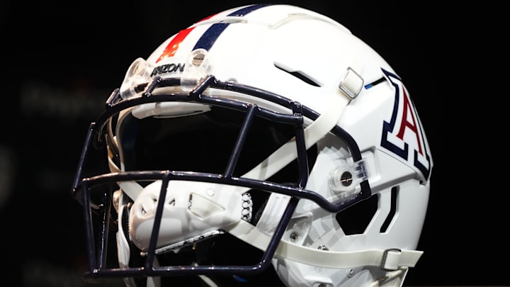 An Arizona Wildcats helmet on display