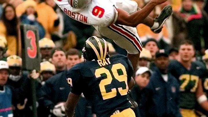Marcus Ray of Michigan puts a big hit on Ohio State's Dave Boston Saturday Nov. 22, 1997.