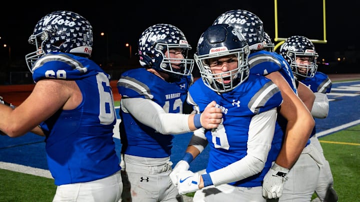 Whitesboro players get pumped up after defeating Horseheads 28-21 in the NYSPHSAA Class A Regional at Cicero-North Syracuse High School on Friday, November 22, 2024.