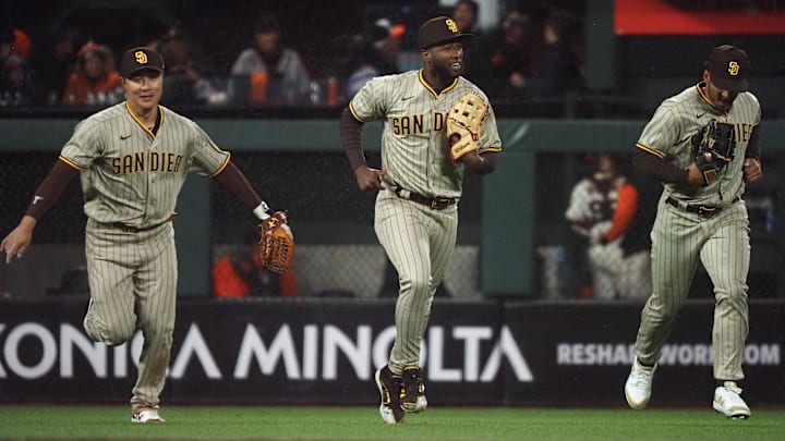 Apr 11, 2022; San Francisco, California, USA; San Diego Padres left fielder Jurickson Profar (10) jogs in with shortstop Ha-Seong Kim (7) and center fielder Trent Grisham (2) after making a catch to end the seventh inning at Oracle Park. Mandatory Credit: Kelley L Cox-Imagn Images Apr 11, 2022; San Francisco, California, USA; San Diego Padres left fielder Jurickson Profar (10) jogs in with shortstop Ha-Seong Kim (7) and center fielder Trent Grisham (2) after making a catch to end the seventh inning at Oracle Park. Mandatory Credit: Kelley L Cox-Imagn Images