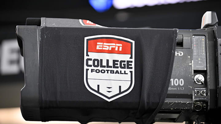 Dec 6, 2025; Arlington, TX, USA; A view of a tv camera and the ESPN college football logo before the game between the Texas Tech Red Raiders and the BYU Cougars at AT&T Stadium. Mandatory Credit: Jerome Miron-Imagn Images