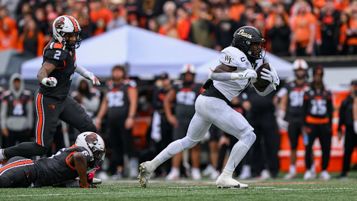 Oct 11, 2025; Corvallis, Oregon, USA; Wake Forest Demon Deacons running back Demond Claiborne (1) runs the ball during the first half against the Oregon State Beavers at Reser Stadium. Mandatory Credit: Craig Strobeck-Imagn Images Oct 11, 2025; Corvallis, Oregon, USA; Wake Forest Demon Deacons running back Demond Claiborne (1) runs the ball during the first half against the Oregon State Beavers at Reser Stadium. Mandatory Credit: Craig Strobeck-Imagn Images