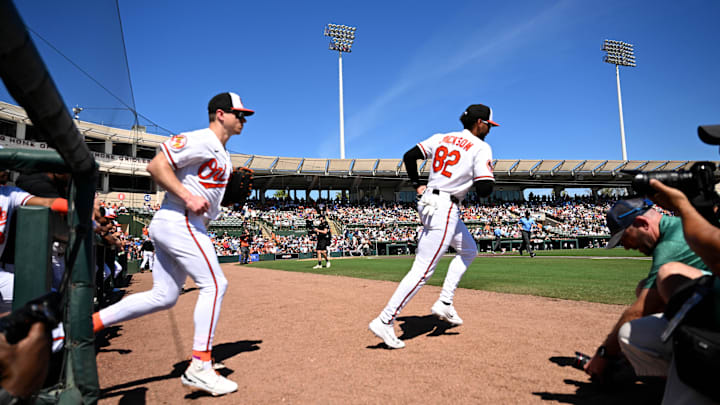 Feb 20, 2026; Sarasota, Florida, USA; Members of the Baltimore Orioles take the field  before the start of the spring training game against the New York Yankees at Ed Smith Stadium. Mandatory Credit: Jonathan Dyer-Imagn Images