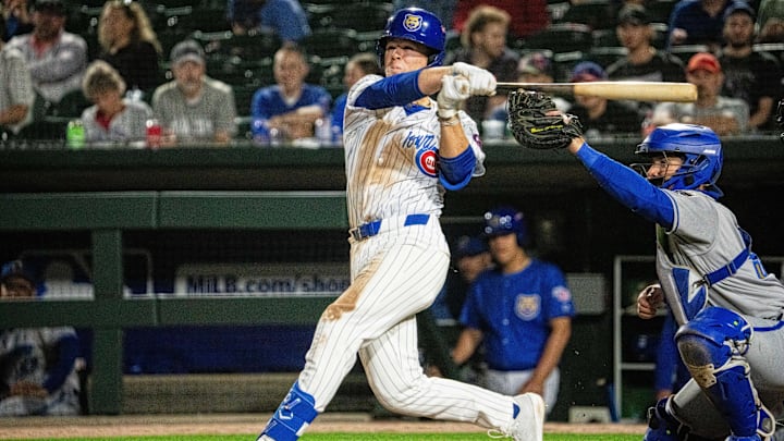 Iowa Cubs' James Triantos (4) swings at the ball on Friday, March 28, 2025, at Principal Park in Des Moines. Iowa Cubs' James Triantos (4) swings at the ball on Friday, March 28, 2025, at Principal Park in Des Moines.