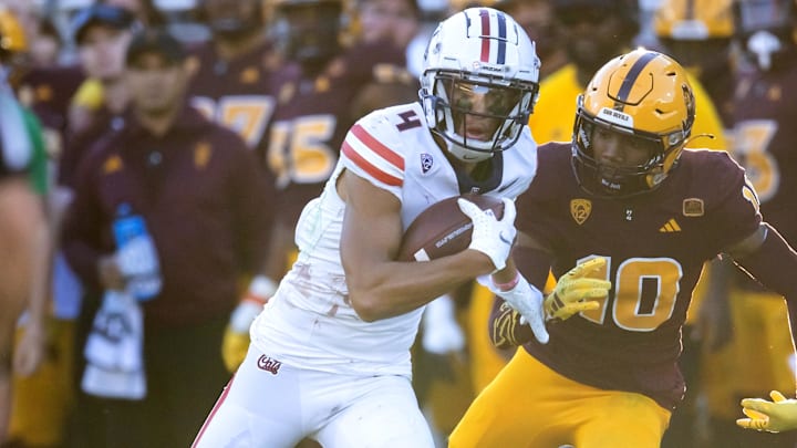 Nov 25, 2023; Tempe, Arizona, USA; Arizona Wildcats wide receiver Tetairoa McMillan (4) against the Arizona State Sun Devils in the first half of the Territorial Cup at Mountain America Stadium Nov 25, 2023; Tempe, Arizona, USA; Arizona Wildcats wide receiver Tetairoa McMillan (4) against the Arizona State Sun Devils in the first half of the Territorial Cup at Mountain America Stadium