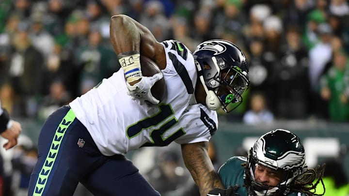 Jan 5, 2020; Philadelphia, Pennsylvania, USA; Seattle Seahawks wide receiver D.K. Metcalf (14) carries the ball after a catch as Philadelphia Eagles cornerback Avonte Maddox (29) attempts to make the tackle during the third quarter in a NFC Wild Card playoff football game at Lincoln Financial Field. Mandatory Credit: Eric Hartline-Imagn Images