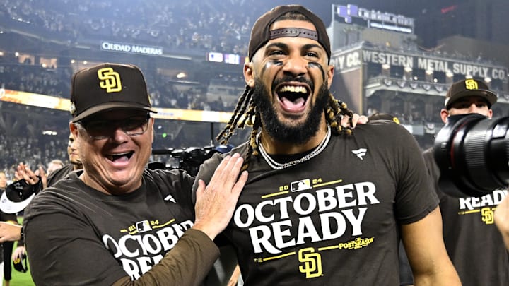 Oct 2, 2024; San Diego, California, USA; San Diego Padres manager Mike Shildt (8) and third baseman Manny Machado (13) celebrate after winning the Wildcard round for the 2024 MLB Playoffs against the Atlanta Braves at Petco Park. Mandatory Credit: Denis Poroy-Imagn Images Oct 2, 2024; San Diego, California, USA; San Diego Padres manager Mike Shildt (8) and third baseman Manny Machado (13) celebrate after winning the Wildcard round for the 2024 MLB Playoffs against the Atlanta Braves at Petco Park. Mandatory Credit: Denis Poroy-Imagn Images