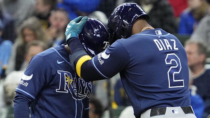 Apr 1, 2026; Milwaukee, Wisconsin, USA; Tampa Bay Rays left fielder Richie Palacios (1), left celebrates Tampa Bay Rays first baseman Yandy Díaz (2) after hitting a home run against the Milwaukee Brewers in the third inning at American Family Field. Mandatory Credit: Michael McLoone-Imagn Images