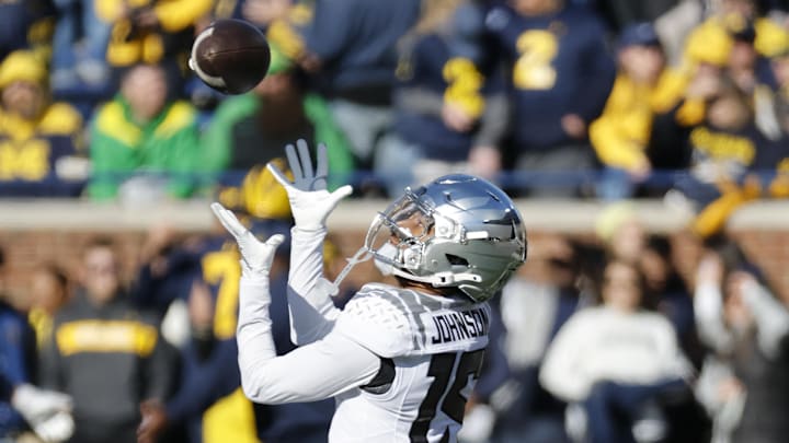 Nov 2, 2024; Ann Arbor, Michigan, USA; Oregon Ducks wide receiver Tez Johnson (15) warms up before the game against the Michigan Wolverines at Michigan Stadium.