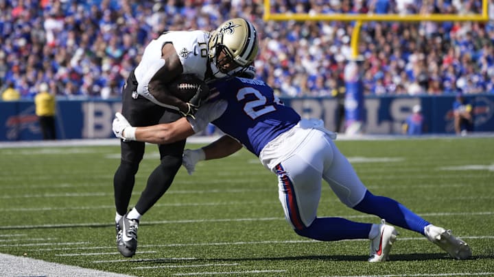 Sep 28, 2025; Orchard Park, New York, USA;   New Orleans Saints wide receiver Brandin Cooks (10) is tackled by Buffalo Bills safety Cole Bishop (24)