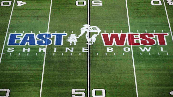 Feb 2, 2023; Las Vegas, NV, USA; The East-West Shrine logo at midfield during the Shrine Bowl at Allegiant Stadium. Feb 2, 2023; Las Vegas, NV, USA; The East-West Shrine logo at midfield during the Shrine Bowl at Allegiant Stadium.