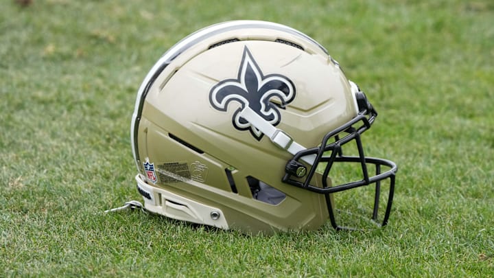 Aug 14, 2025; Carson, CA, USA; A New Orleans Saints helmet on the field during a joint practice against the Los Angeles Rams at the Dignity Health Sports Park. 